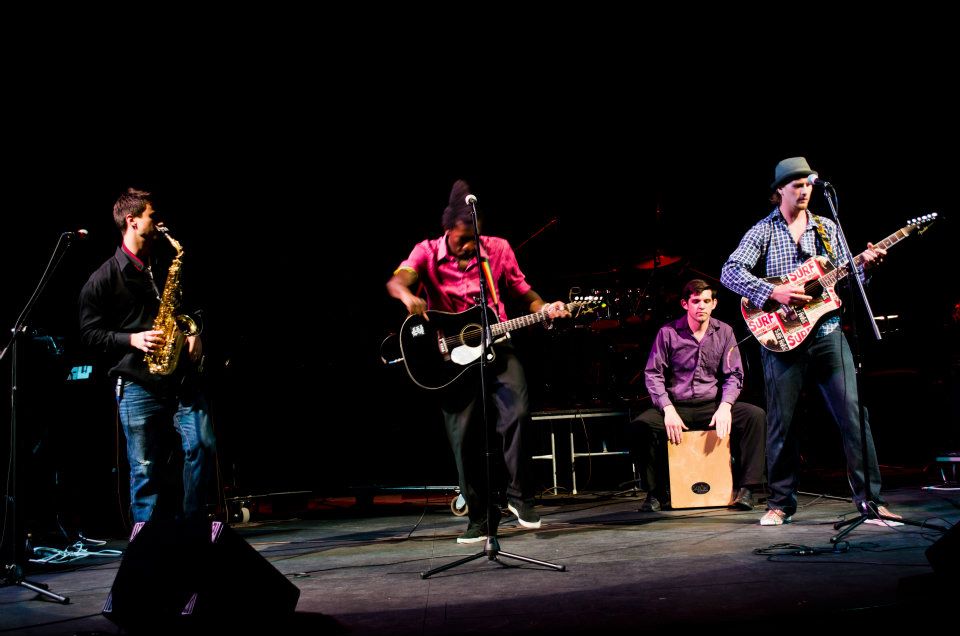 Brothers of March performing on a theatre stage
